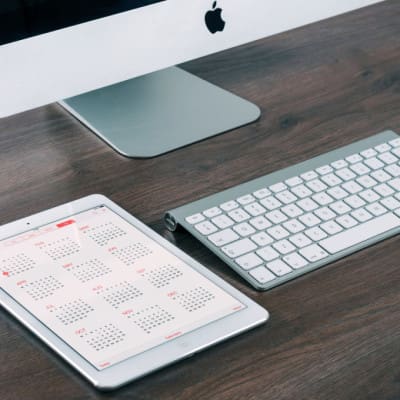 Computer with iPad and calendar