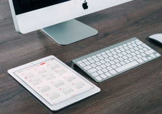 Computer with iPad and calendar